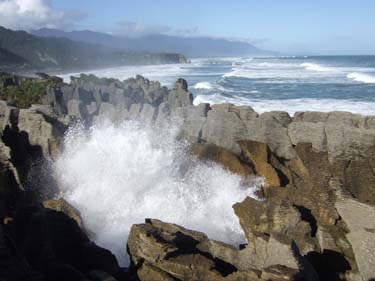 Potai surge at Pancake Rocks, Punakaiki. South Island, New Zealand